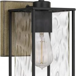 Holsten 6 in. 1-Light Matte Black Sconce with Clear Hammered Glass Shade by Quoizel -Quoizel Sales matte black quoizel vanity lighting htn8606mbk 44 1000