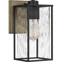 Holsten 6 in. 1-Light Matte Black Sconce with Clear Hammered Glass Shade by Quoizel