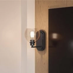 Pruitt 1-Light Matte Black Wall Sconce by Quoizel -Quoizel Sales matte black quoizel vanity lighting pruc8607mbk 1f 1000