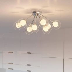 Spellbound 23 in. 9-Light Polished Chrome Semi-Flush Mount by Quoizel -Quoizel Sales polished chrome quoizel flush mount lights pcsb1722c 44 1000