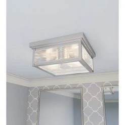 Gardner 2-Light Stainless Steel Flush Mount with Clear Ribbed Glass by Quoizel -Quoizel Sales stainless steel quoizel flush mount lights gar1312ss e1 1000